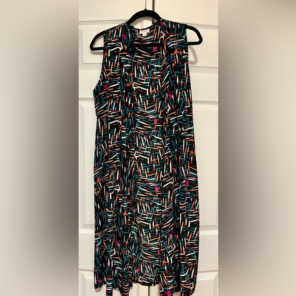 LuLaroe Joy long vest.  Black with abstract pattern In polyester. Size Large